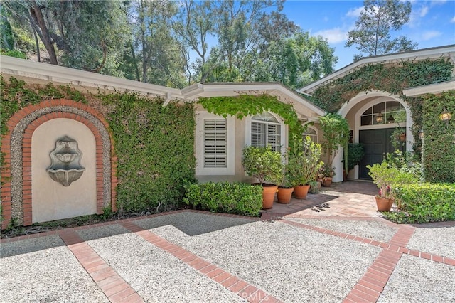3818 Hayvenhurst Ave, Encino, CA 91436 - view of exterior entry with stucco siding