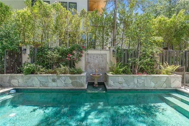 3818 Hayvenhurst Ave, Encino, CA 91436 - view of pool with a fenced backyard