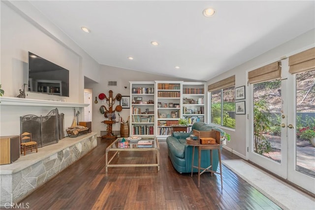 3818 Hayvenhurst Ave, Encino, CA 91436 - sitting room featuring lofted ceiling, hardwood / wood-style flooring, a fireplace with raised hearth, recessed lighting, and french doors