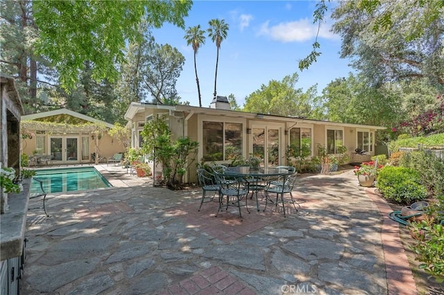 3818 Hayvenhurst Ave, Encino, CA 91436 - view of patio with french doors and an outdoor pool