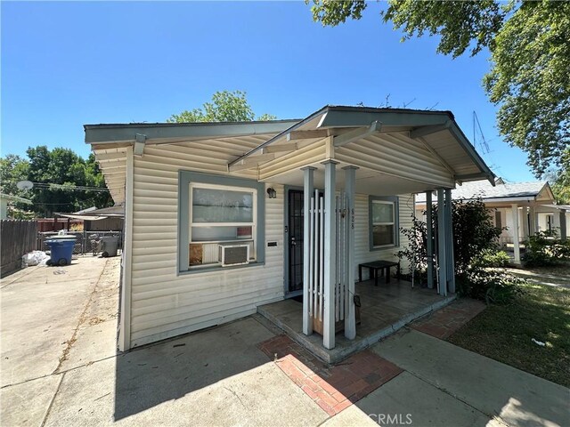 828 W 23rd St, Merced, CA 95340 - exterior space with covered porch and cooling unit