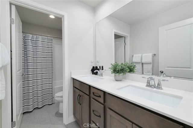 656 Daniel Freeman Cir, Inglewood, CA 90301 - full bathroom with double vanity, toilet, and shower / bathtub combination with curtain
