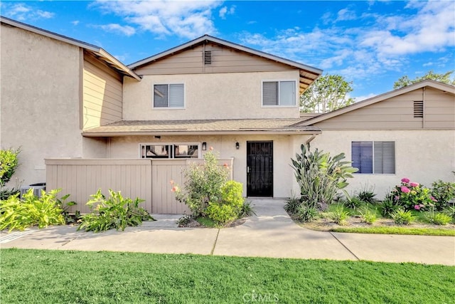 1425 Forest Glen Dr Unit 159, Hacienda Heights, CA 91745 - view of front of home with stucco siding and roof with shingles