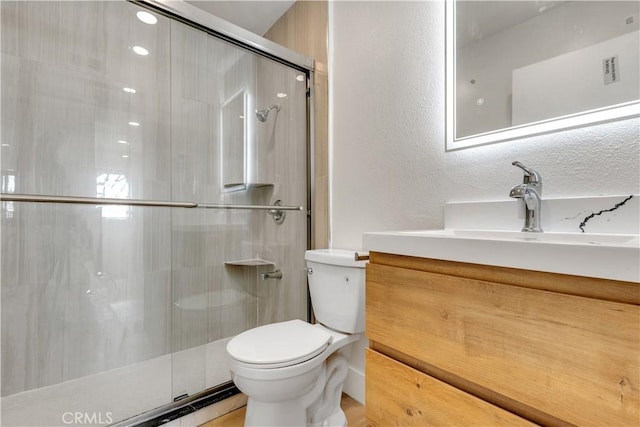 1425 Forest Glen Dr Unit 159, Hacienda Heights, CA 91745 - full bathroom with toilet, vanity, a shower stall, and a textured wall