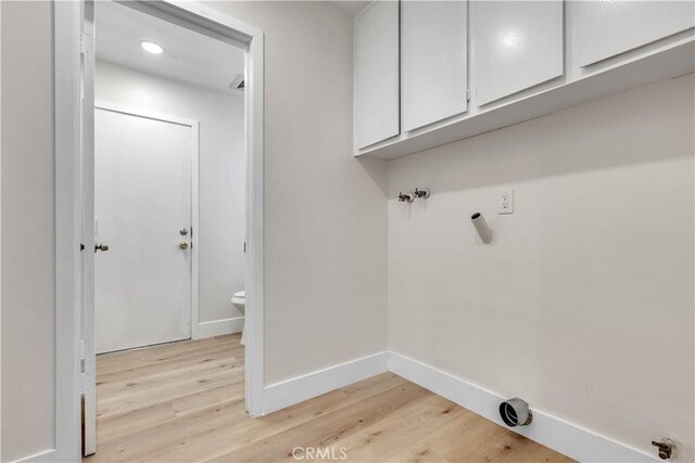 1425 Forest Glen Dr Unit 159, Hacienda Heights, CA 91745 - washroom with cabinet space, light wood finished floors, baseboards, hookup for a washing machine, and recessed lighting