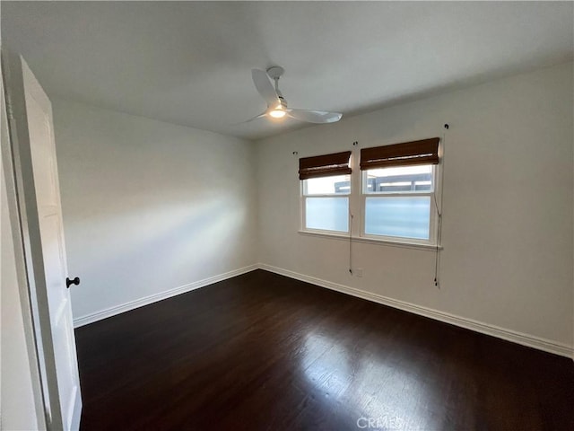 2221 Granada Ave, Long Beach, CA 90815 - spare room with dark wood-style floors, ceiling fan, and baseboards