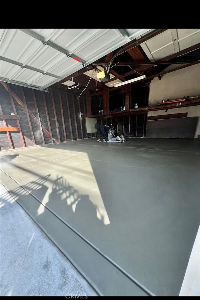 2221 Granada Ave, Long Beach, CA 90815 - garage featuring a garage door opener