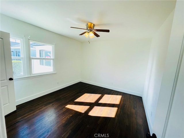 2221 Granada Ave, Long Beach, CA 90815 - spare room featuring dark wood-style floors, ceiling fan, and baseboards