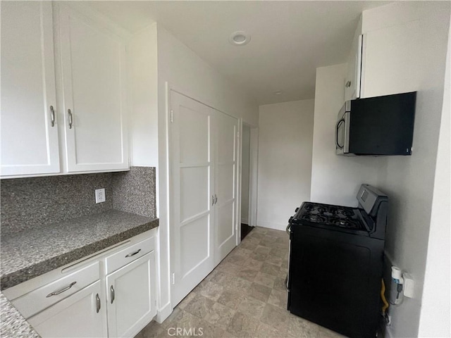 2221 Granada Ave, Long Beach, CA 90815 - kitchen featuring range with gas cooktop, stainless steel microwave, white cabinets, and dark countertops