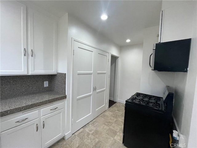 2221 Granada Ave, Long Beach, CA 90815 - kitchen featuring gas range oven, white cabinetry, dark countertops, recessed lighting, and decorative backsplash