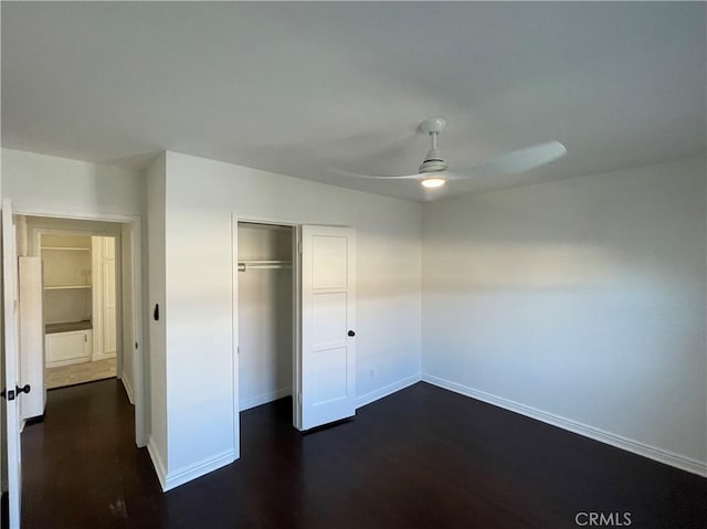 2221 Granada Ave, Long Beach, CA 90815 - unfurnished bedroom with dark wood finished floors, baseboards, a closet, and a ceiling fan