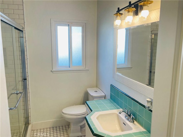 2221 Granada Ave, Long Beach, CA 90815 - bathroom featuring toilet, a stall shower, tile patterned flooring, tasteful backsplash, and vanity
