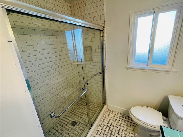 2221 Granada Ave, Long Beach, CA 90815 - bathroom with a shower stall, toilet, and baseboards