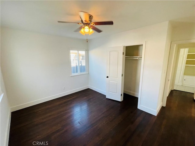 2221 Granada Ave, Long Beach, CA 90815 - unfurnished bedroom featuring dark wood-type flooring, baseboards, a closet, and ceiling fan