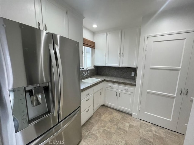 2221 Granada Ave, Long Beach, CA 90815 - kitchen featuring stainless steel fridge, a sink, white cabinetry, recessed lighting, and dark countertops