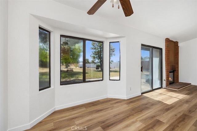 41586 Zinfandel Ave, Temecula, CA 92591 - empty room featuring ceiling fan, healthy amount of natural light, and light wood-style flooring
