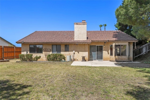 41586 Zinfandel Ave, Temecula, CA 92591 - back of house featuring a chimney, stucco siding, a patio area, and central air condition unit