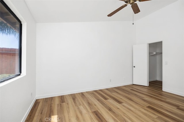 41586 Zinfandel Ave, Temecula, CA 92591 - unfurnished bedroom featuring wood finished floors, baseboards, ceiling fan, and a closet