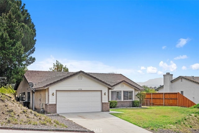 41586 Zinfandel Ave, Temecula, CA 92591 - ranch-style house featuring brick siding, an attached garage, and driveway