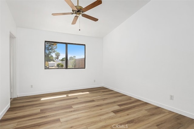 41586 Zinfandel Ave, Temecula, CA 92591 - empty room featuring light wood-style floors, a ceiling fan, baseboards, and lofted ceiling
