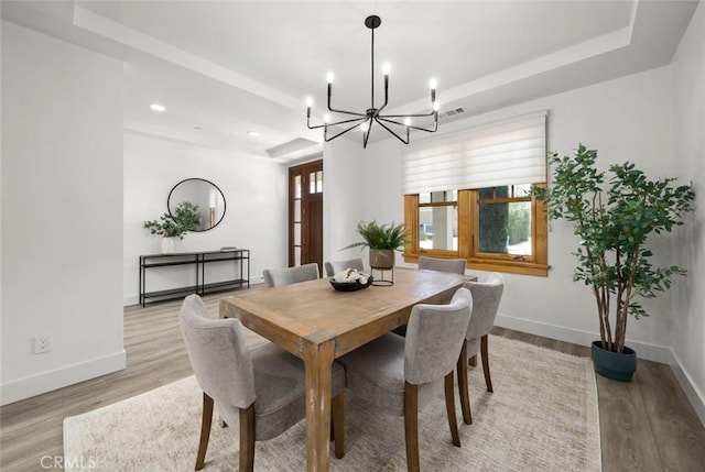 313 Myrtle Dr, Arroyo Grande, CA 93420 - dining room with a raised ceiling, a chandelier, light wood finished floors, baseboards, and recessed lighting