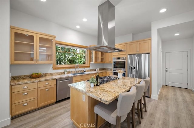 313 Myrtle Dr, Arroyo Grande, CA 93420 - kitchen with stainless steel appliances, a sink, island range hood, light wood-style floors, and recessed lighting