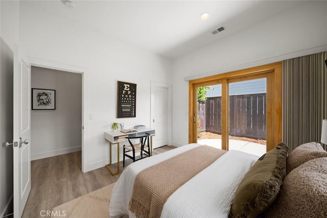 313 Myrtle Dr, Arroyo Grande, CA 93420 - bedroom with access to exterior, baseboards, and wood finished floors