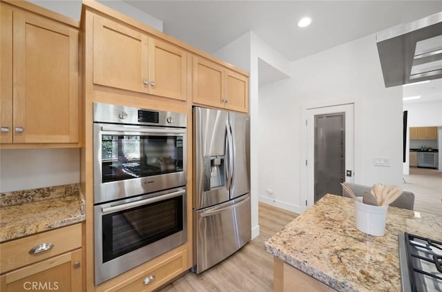 313 Myrtle Dr, Arroyo Grande, CA 93420 - kitchen with appliances with stainless steel finishes, light brown cabinets, light wood-style flooring, light stone counters, and recessed lighting