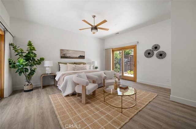 313 Myrtle Dr, Arroyo Grande, CA 93420 - bedroom featuring wood finished floors, baseboards, and access to exterior