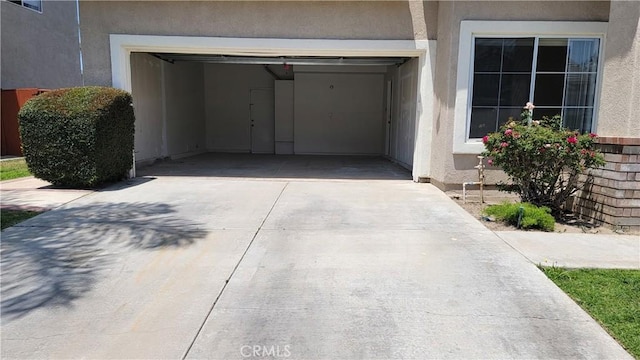 241 Exeter Way, Corona, CA 92882 - garage featuring concrete driveway