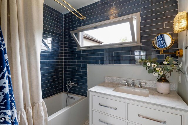 2384 E Orange Grove Blvd, Pasadena, CA 91104 - full bathroom featuring vanity, healthy amount of natural light, and shower / tub combo with curtain