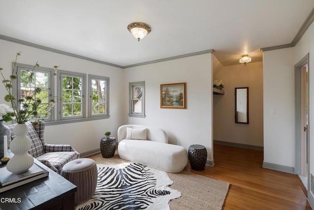 2384 E Orange Grove Blvd, Pasadena, CA 91104 - living area featuring wood finished floors, crown molding, and baseboards