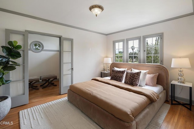 2384 E Orange Grove Blvd, Pasadena, CA 91104 - bedroom with wood finished floors and crown molding