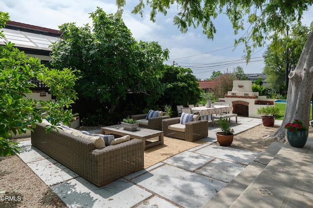2384 E Orange Grove Blvd, Pasadena, CA 91104 - view of patio featuring an outdoor living space with a fireplace