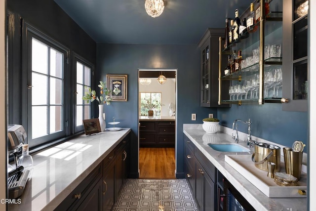2384 E Orange Grove Blvd, Pasadena, CA 91104 - kitchen featuring a sink and glass insert cabinets