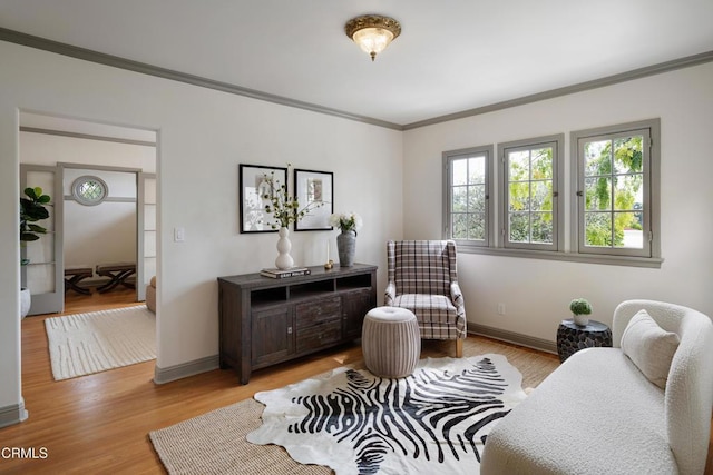 2384 E Orange Grove Blvd, Pasadena, CA 91104 - living area featuring ornamental molding, light wood finished floors, and baseboards