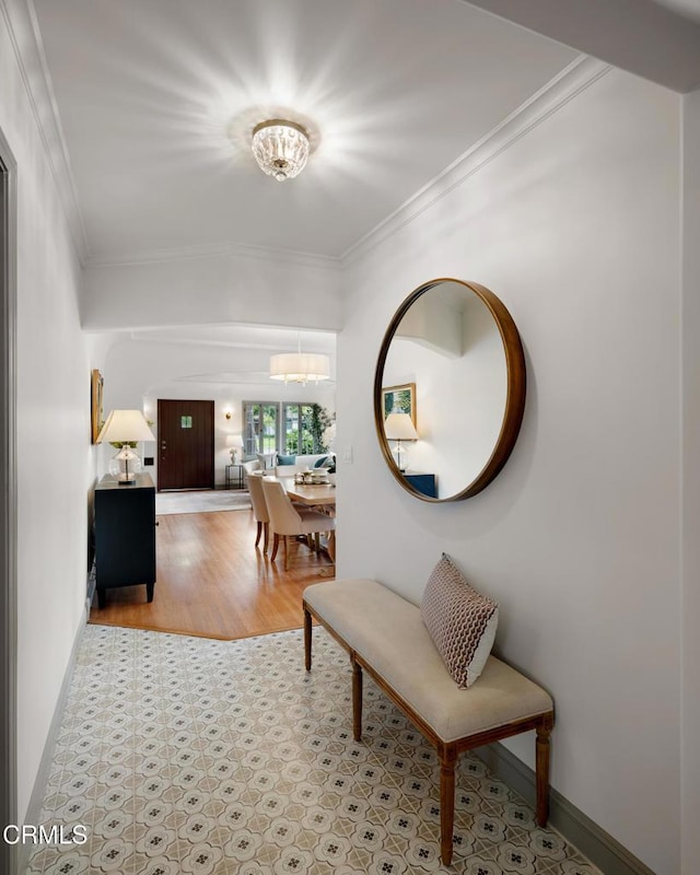 2384 E Orange Grove Blvd, Pasadena, CA 91104 - corridor with a chandelier, crown molding, light floors, and baseboards