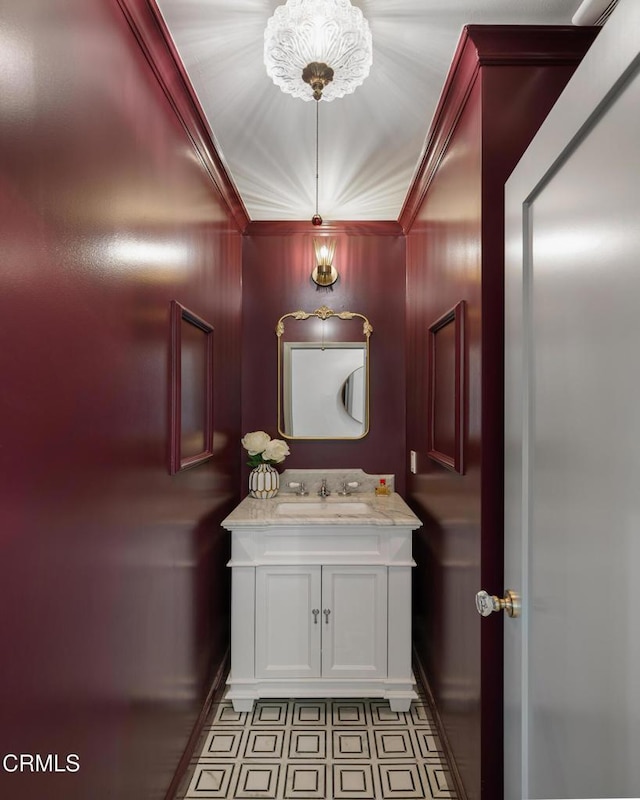 2384 E Orange Grove Blvd, Pasadena, CA 91104 - bathroom with crown molding, vanity, and tile patterned floors
