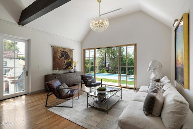 2384 E Orange Grove Blvd, Pasadena, CA 91104 - living room with a chandelier, wood finished floors, and high vaulted ceiling