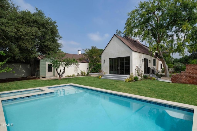 2384 E Orange Grove Blvd, Pasadena, CA 91104 - view of pool with a lawn, an outdoor structure, and an in-ground hot tub