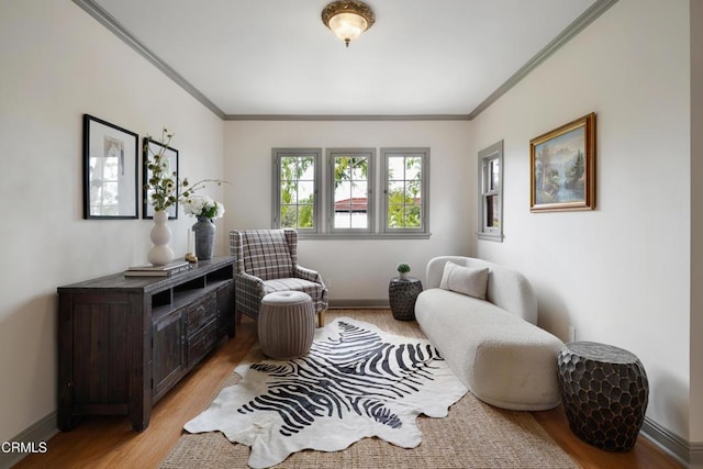 2384 E Orange Grove Blvd, Pasadena, CA 91104 - sitting room with ornamental molding, light wood finished floors, and baseboards