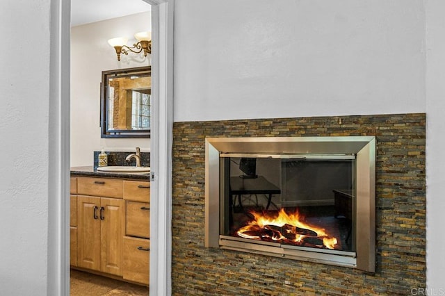 1923 Hidden Mesa Rd, El Cajon, CA 92019 - detailed view of a sink and a warm lit fireplace
