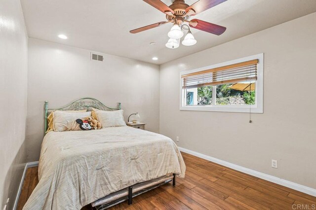 1923 Hidden Mesa Rd, El Cajon, CA 92019 - bedroom with wood finished floors, recessed lighting, and ceiling fan