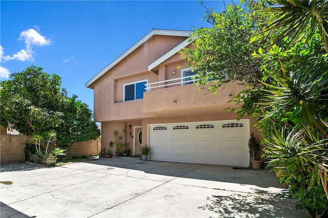 11889 Gale Ave, Hawthorne, CA 90250 - view of front of house featuring stucco siding, driveway, and an attached garage