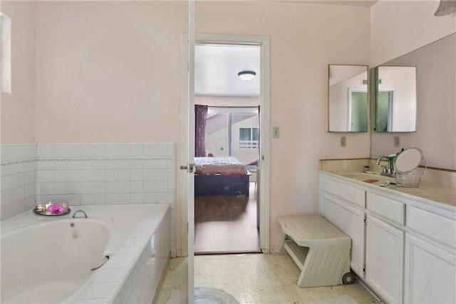 11889 Gale Ave, Hawthorne, CA 90250 - full bathroom with a garden tub, vanity, and connected bathroom
