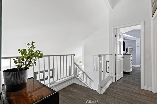39985 Falcon Way, Murrieta, CA 92562 - corridor featuring an upstairs landing, dark wood finished floors, and baseboards