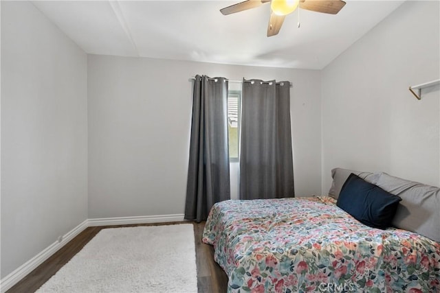 39985 Falcon Way, Murrieta, CA 92562 - bedroom with wood finished floors, baseboards, and a ceiling fan