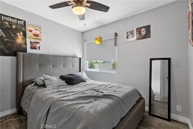 39985 Falcon Way, Murrieta, CA 92562 - bedroom with wood finished floors, baseboards, and a ceiling fan