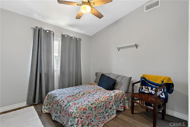 39985 Falcon Way, Murrieta, CA 92562 - bedroom featuring wood finished floors, baseboards, vaulted ceiling, and a ceiling fan