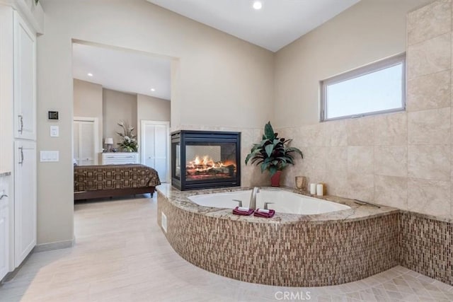 3352 Studio Dr, Cayucos, CA 93430 - full bath featuring a garden tub, a multi sided fireplace, and recessed lighting
